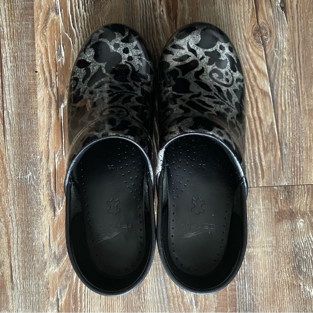 Dansko Black and Silver Patterned Clogs